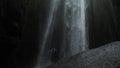 Powerful Gljufrabui or Gljufurarfoss hidden waterfall inside the cave in Iceland