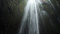 Powerful Gljufrabui or Gljufurarfoss hidden waterfall inside the cave in Iceland