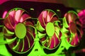 Powerful graphics card with three fans and a futuristic red-green neon backlight