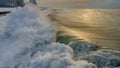 Powerful green foamy wave crushing on a shore