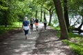 Powerful happy elderly people are walking, running in the park