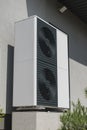 Powerful heat pump for heating and air conditioning of a modern private house. Energy saving technology concept