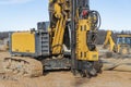 Powerful hydraulic drilling rig at a construction site. The device of pile foundations. Bored piles. Heavy construction equipment