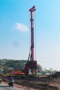 Powerful hydraulic machine drilling rig on a construction site. Installation of bored piles by drilling. Pile foundations.