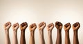 Diverse hands raised in unity and solidarity for social justice and equality demonstration and protest Royalty Free Stock Photo