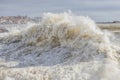 Powerful ocean wave breaking ina windy day in Spanish town Palamos in Costa Brava Royalty Free Stock Photo