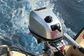 Powerful outboard engine on a speedboat. Water splashes wake up Royalty Free Stock Photo