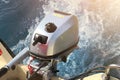 Powerful outboard engine on a speedboat. Water splashes wake up Royalty Free Stock Photo
