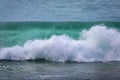 Powerful Pacific Ocean wave breaking by the beach in Southern California