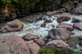 Rushing river flowing through eroded rocks in Tingo Maria Peru Royalty Free Stock Photo