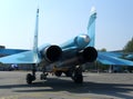 Powerful Russian military jet fighter plane on the runway of the SU-34 two jet turbine engine Royalty Free Stock Photo