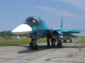 Powerful Russian military jet fighter plane on the runway of the SU-34 two jet turbine engine