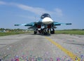 Powerful Russian military jet fighter plane on the runway of the SU-34 two jet turbine engine