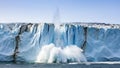 Deep Iceberg Calving Glacier Breakoff in Antarctica with Sea Splash Royalty Free Stock Photo
