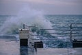 Powerful sea splash wave on the pier Royalty Free Stock Photo