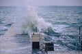 Powerful sea splash wave on the pier Royalty Free Stock Photo