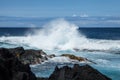 Powerful Shore Break on Hawaii`s Lava Rock Coast with Splash