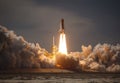 Space Shuttle Launch Fiery Ascent Amidst Billowing Smoke and Dramatic Lighting Royalty Free Stock Photo