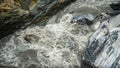 Powerful Stream of River Flowing Across Marble Rocks at Taroko Gorge National Park in Taiwan