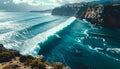 Powerful Turquoise Wave Along a Cliffside Shore Royalty Free Stock Photo