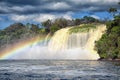Powerful waterfall and rainbow