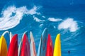 Powerful waves break at Lumahai Beach, Kauai with Surfboards