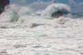 Powerful waves, breaking on the rocky shoreline, dynamic coastal Royalty Free Stock Photo