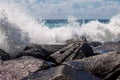 Powerful Waves Crashing over Rocks Royalty Free Stock Photo