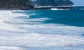 Powerful waves flow over rocks at Lumahai Beach, Kauai