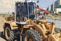 Powerful wheel loader for transporting bulky goods at the construction site of a modern residential area. Construction equipment Royalty Free Stock Photo