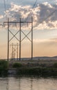 Powerlines crossing the headwaters of the Missouri river Royalty Free Stock Photo