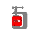 Risk reduction concept shows a clamp compressing red risk cube