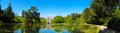 Powerscourt Estate in Ireland. View on lake and green woods, castle in the background Royalty Free Stock Photo