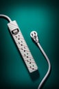 Powerstrip on vibrant teal background Royalty Free Stock Photo