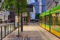 PoznaÃâ, Poland -27.05.2023- running greens and yellow trams in Pozna