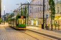 PoznaÃâ, Poland -27.05.2023- running greens and yellow trams in Pozna