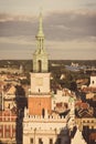 Poznan, Poland - August 30, 2016: Vintage photo, Town hall, old and modern buildings at sunset in city Poznan Royalty Free Stock Photo