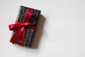 Poznan, Poland - 06.03.2023: Gift wrapping of perfume with a red bow from the Douglas store