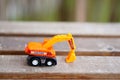 Small plastic toy excavator