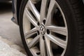 The Volkswagen company logo is on the rim of a car wheel. Royalty Free Stock Photo