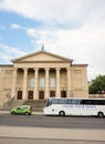 POZNAN, POLAND - May 30, 2018: Travel bus and Grand Theater building Royalty Free Stock Photo