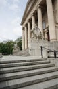 Vertical shot of stairs leading to the entrance of the Grand Theater building in Poznan, Poland Royalty Free Stock Photo