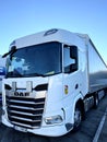 Poznan, Poland 01.03.2023: New DAF XF truck with schmitz curtain trailer