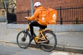 Poznan, Poland - November 2022: Pyszne.pl bike courier on the street