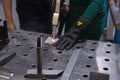 Cutting steel, plasma. A woman cuts steel