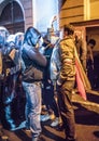 Nationalists, hooligans and fascists awaiting the Parliament Member Winnicki. On the other side of street people protesting agains Royalty Free Stock Photo