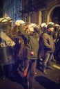 Nationalists, hooligans and fascists awaiting the Parliament Member Winnicki. On the other side of street people protesting agains Royalty Free Stock Photo