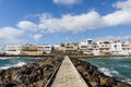 Pozo Izquierdo overlook with breakwater with a sidewalk, Gran Canaria, Spain Royalty Free Stock Photo