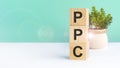 PPC text on wood cubes, business concept. front view. PPC acronym Pay Per Click Royalty Free Stock Photo