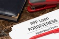 PPP loan forgiveness text on application form paper. Small Business Payroll Protection Program Royalty Free Stock Photo